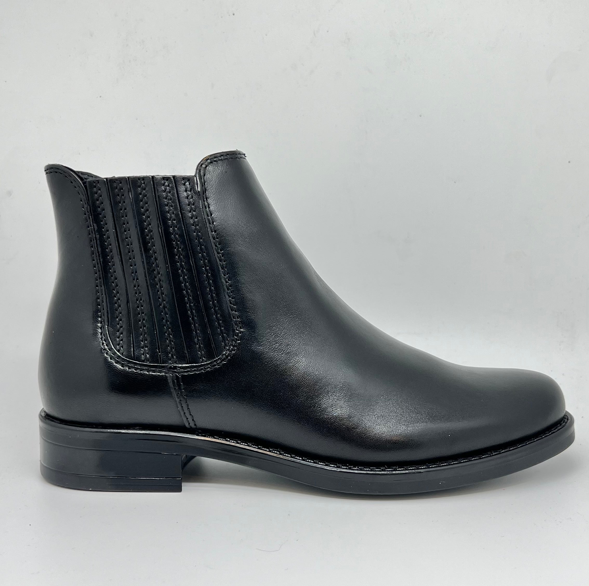 Stivaletti Beatles in pelle nera e zip